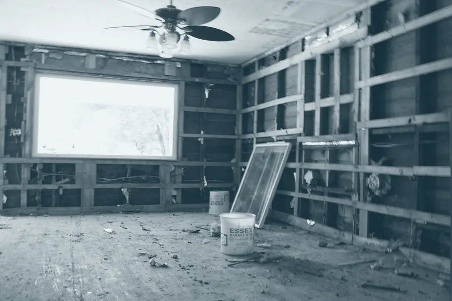 A room stripped to the studs after water damage