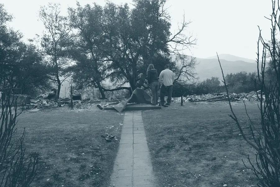 The foundation and chimney of a house destroyed by wildfire